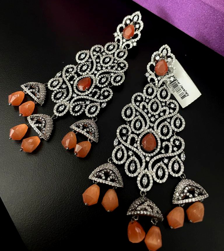 Black Rose Plated Peach Stone Long Earrings.