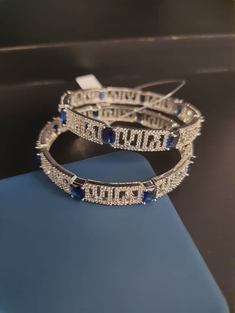 Silver Plated Bangles In Blue Stone.