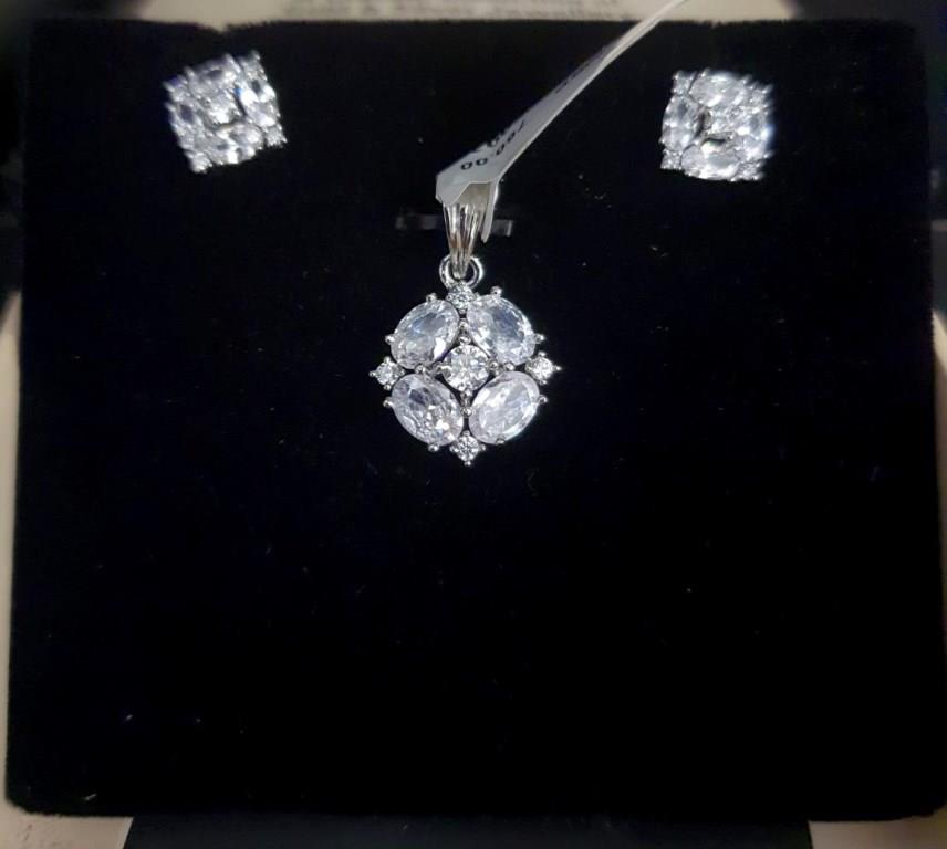 Small Pendant Set In CZ Diamond Stone.