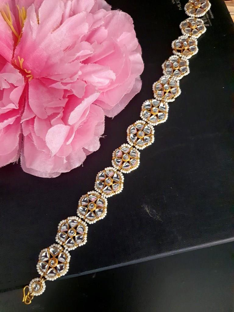 Studded With Kundan Shishphool.