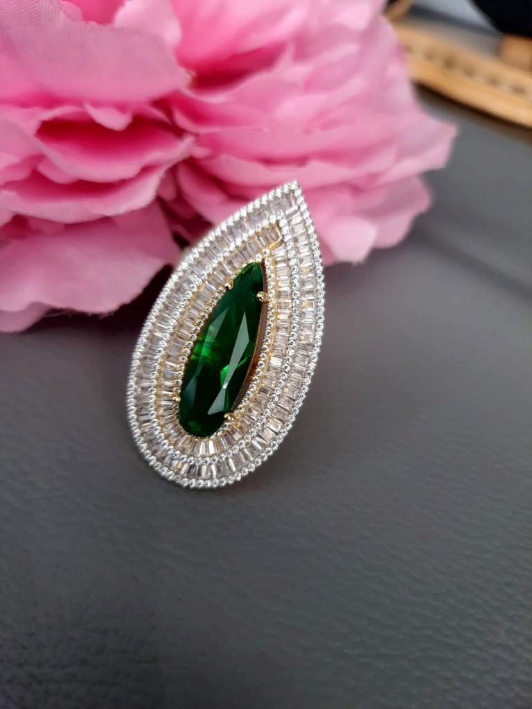 Baguette Diamond With Green Color Stone.