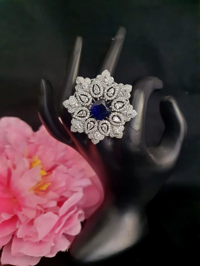 Designer Rhodium Plated With Navy Blue Stone.